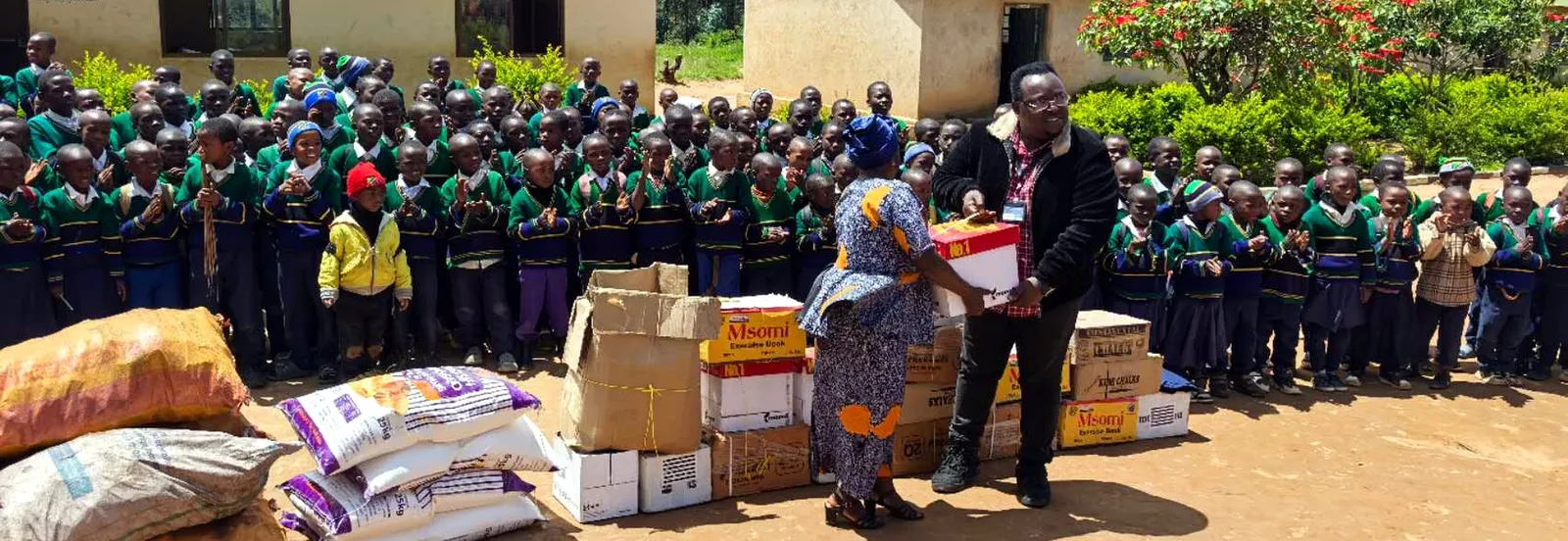 Donation of teaching aids, books and food to a local school